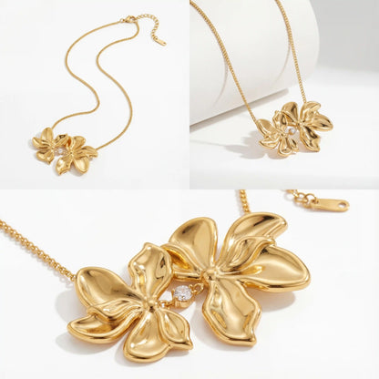 Aesthetic product photography of textured gold flower necklace details on white background.