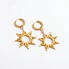 Pair of gold sunburst dangle earrings with huggie hoop waterproof stainless steel.