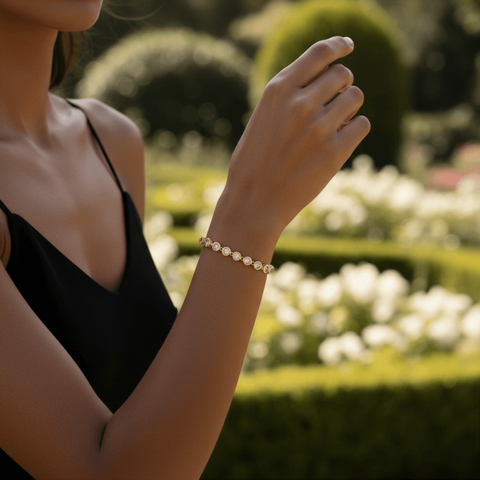 Model wearing the Sweetheart Pink Crystal Tennis Bracelet stacked with a gold watch.