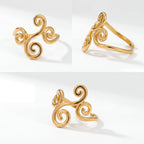 Three angles of gold wire spiral ring showing open adjustable band design.