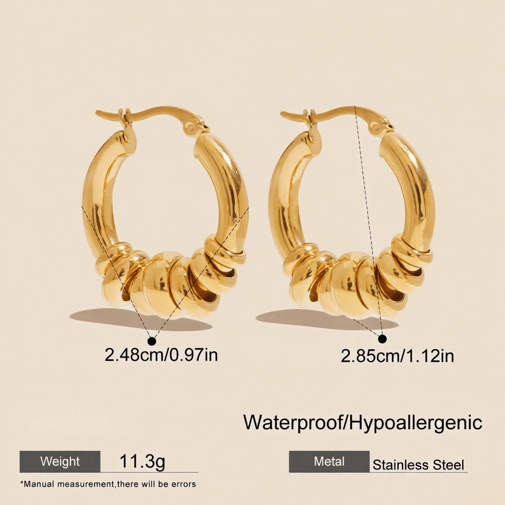 A pair of all-gold Siena Stacked Hoops, highlighting the textural, multi-ring design and high-shine 18K gold finish.