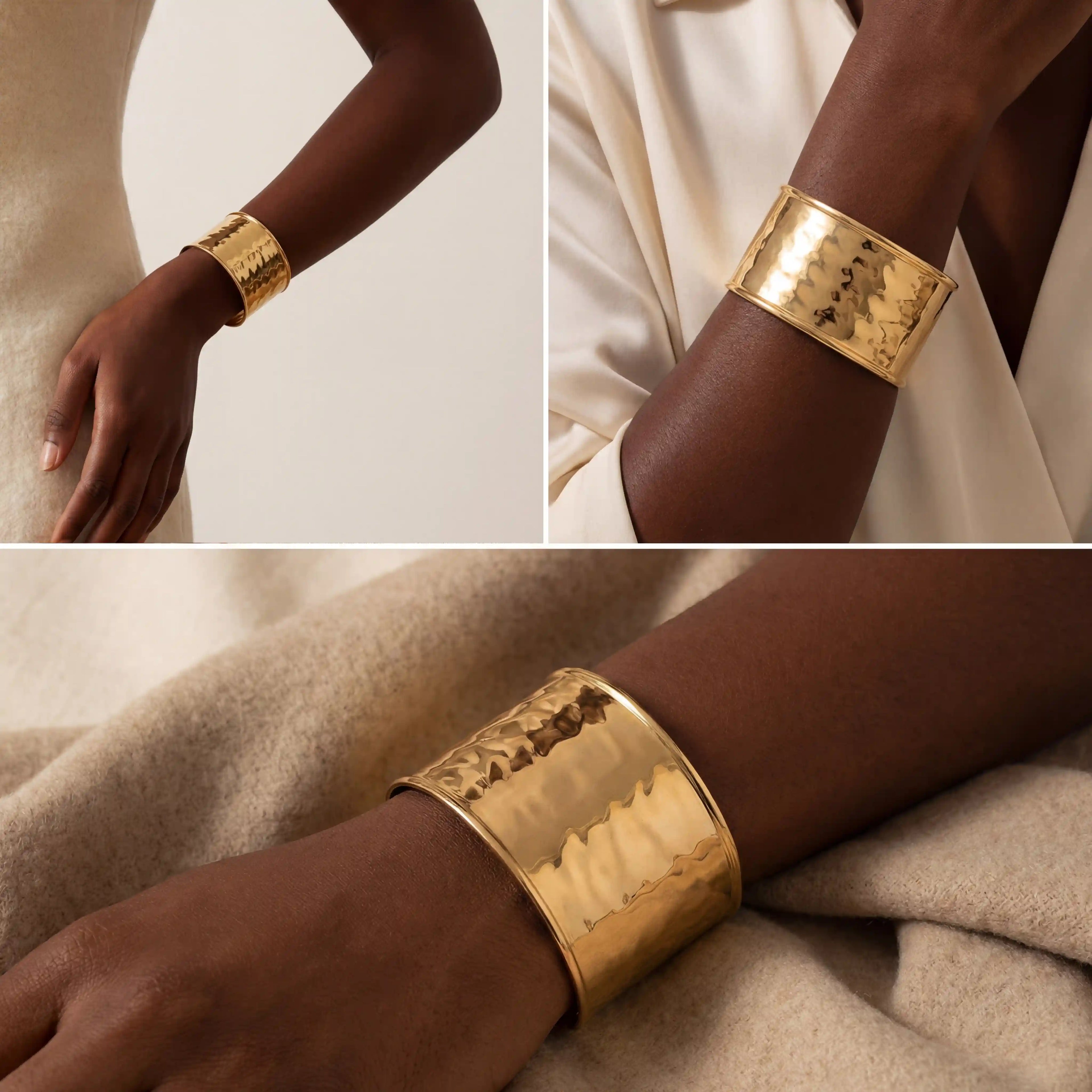 Model with dark skin styling bold gold bangle bracelet aura cuff.