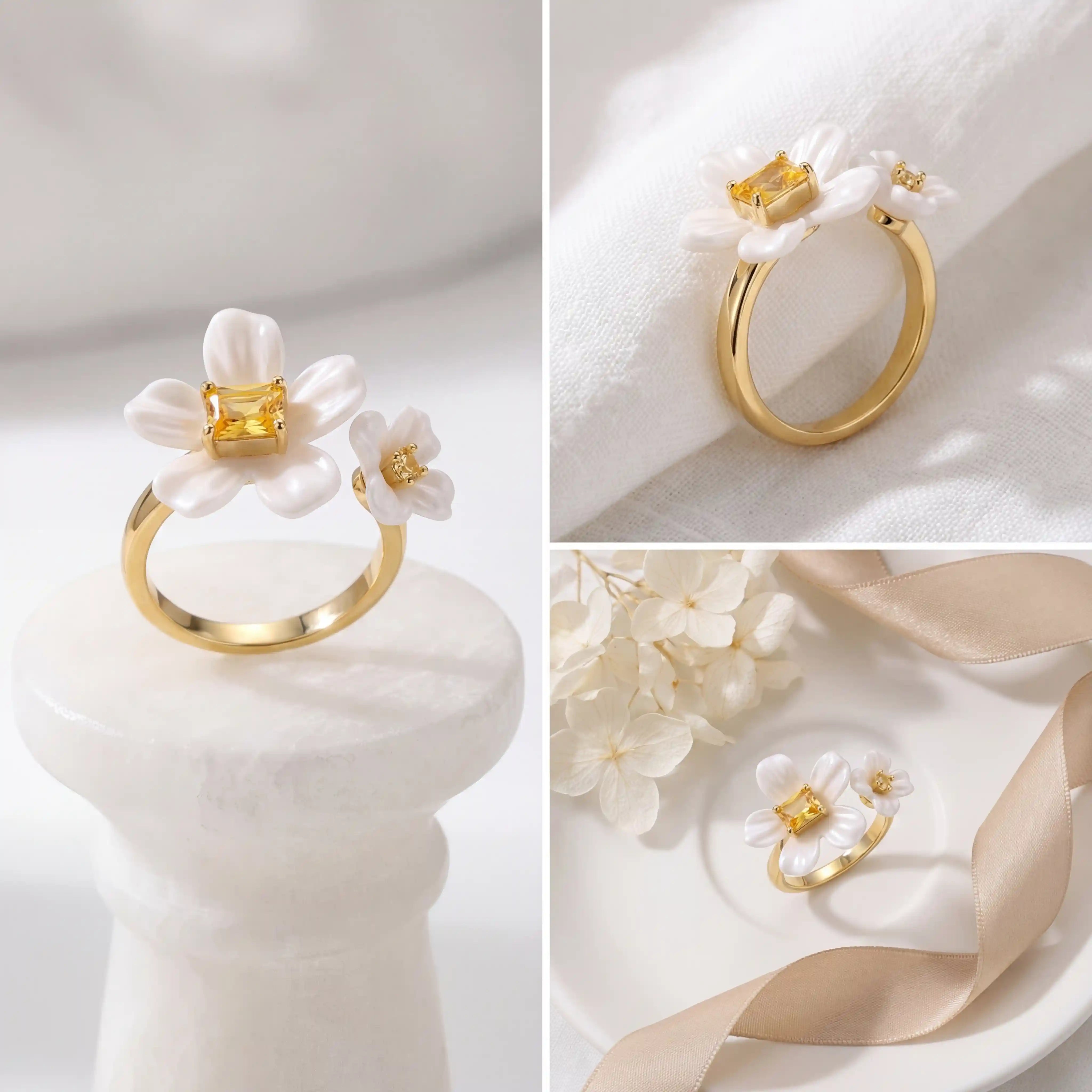Aesthetic product photography collage of white enamel floral ring on pedestal with ribbon.