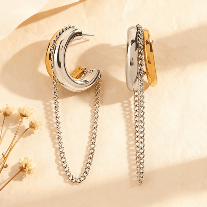 Luxe Layered Chain Hoops in two-tone gold and silver with a chunky C-shape and a dangling silver chain.