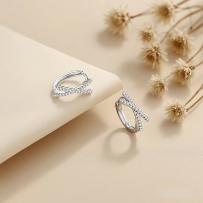 Stellar Cross Moissanite Earrings — radiant moissanite cross studs on neutral background, spiritual and elegant.