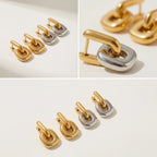 Aesthetic product photography of gold and two-tone urban link earrings collection on stone.