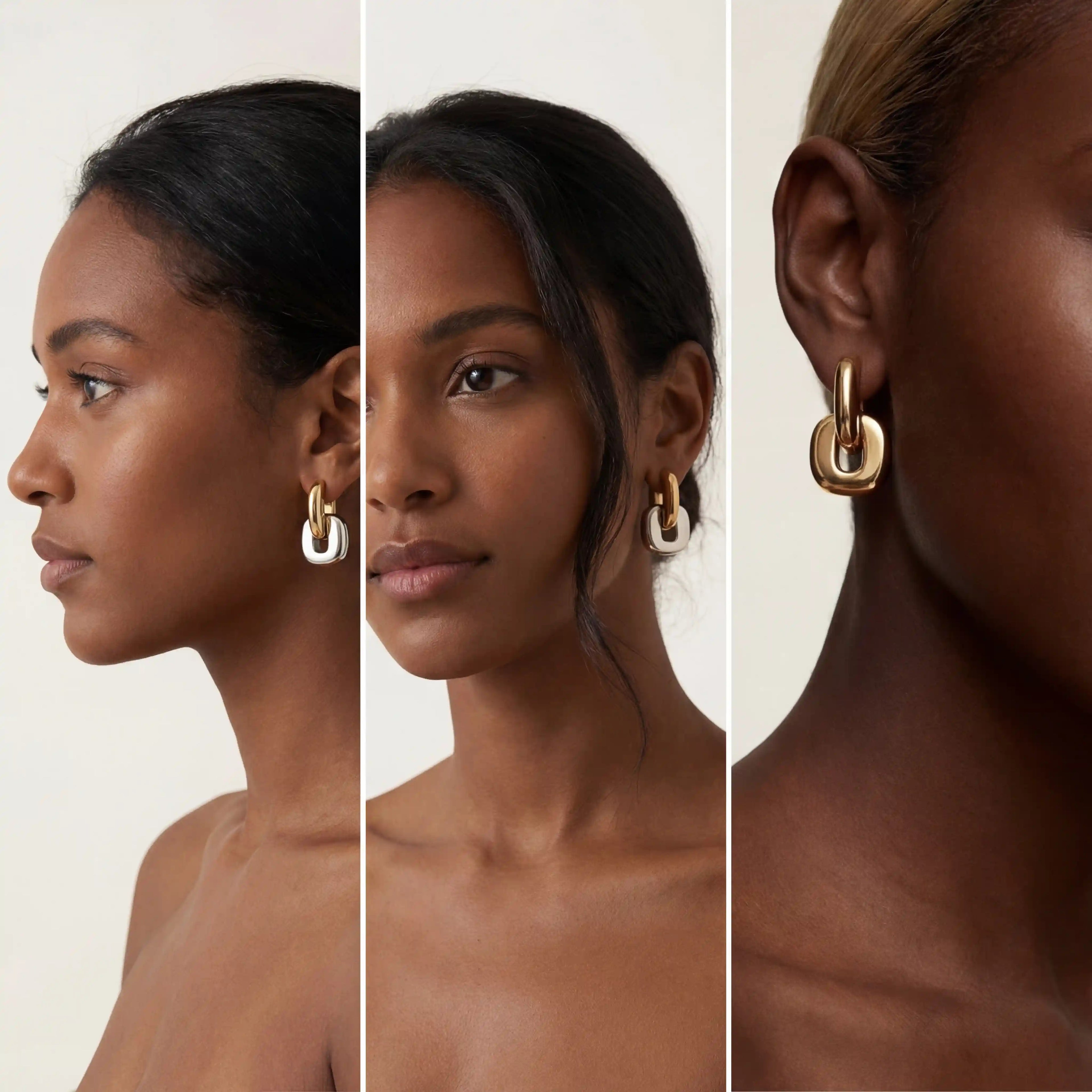 Model with dark skin wearing mixed metal square link earrings modern statement jewelry.