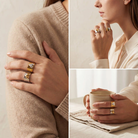 Lifestyle photography of woman wearing gold and silver heart rings holding coffee cup.