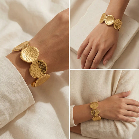 Lifestyle mood board of statement gold hammered cuff styling on wrist.