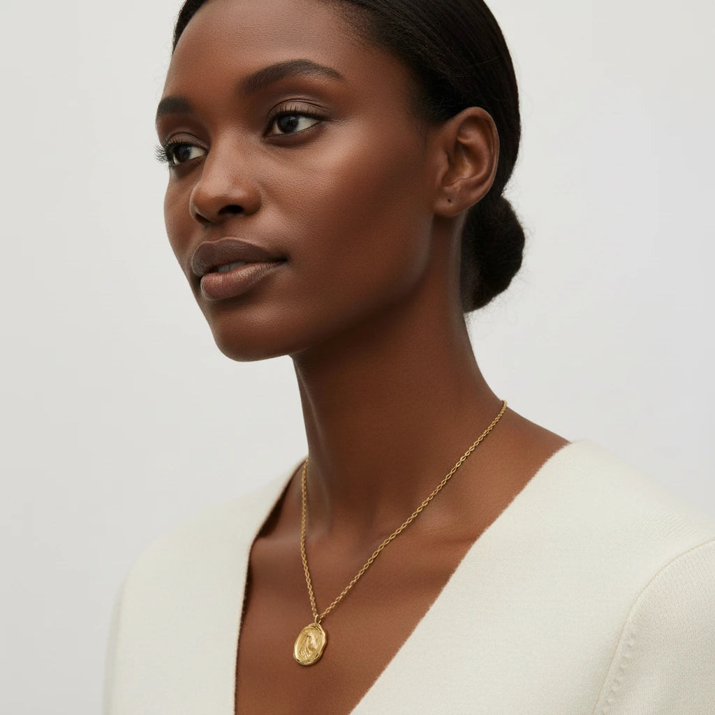 Side profile of model wearing gold box chain horoscope necklace personalized gift for her.