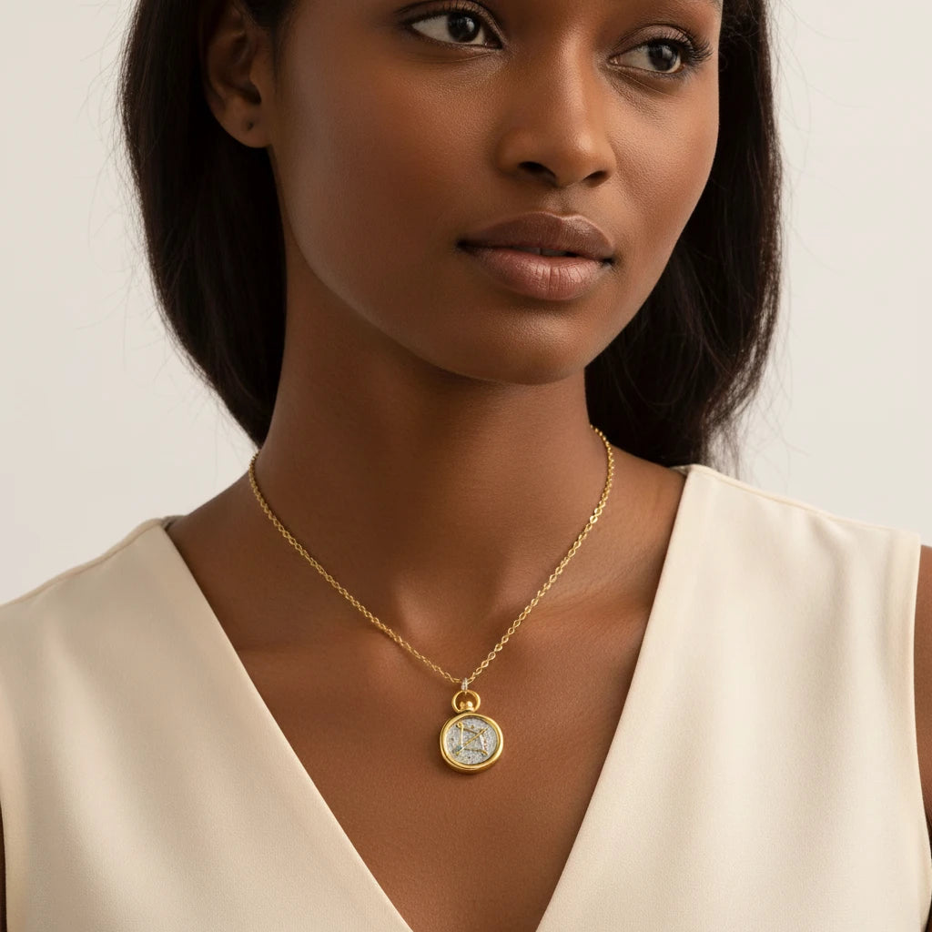 Model wearing vintage style gold and silver zodiac pendant necklace everyday jewelry