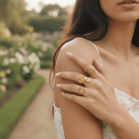 Sunlight dapples on a model's hand as she relaxes by the pool, with the waterproof Liquid Gold Ring gleaming. This lifestyle shot emphasizes the ring's durability and suitability for travel and leisure.