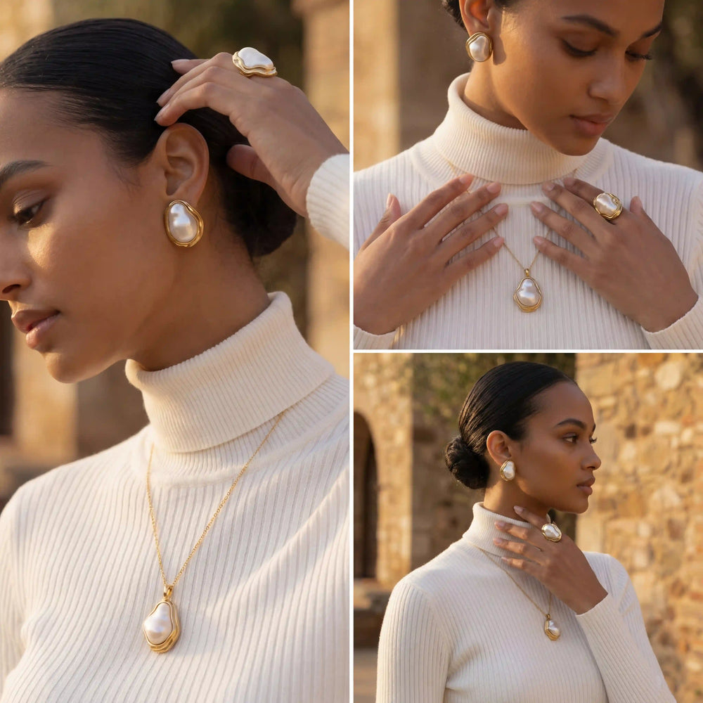 Side profile of a model in an outdoor setting, her hair in an elegant updo, wearing The Theia Earrings as a statement of timeless, natural beauty.